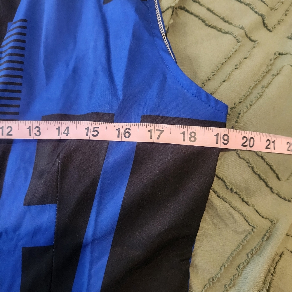 Nice Fashion blue and black jumpsuit. Patterns have circles and stripes. - Picture 8 of 10